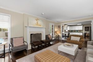 Living room with fireplace and hardwood floors at 176 Arlington Row in Castlegate, Macon GA